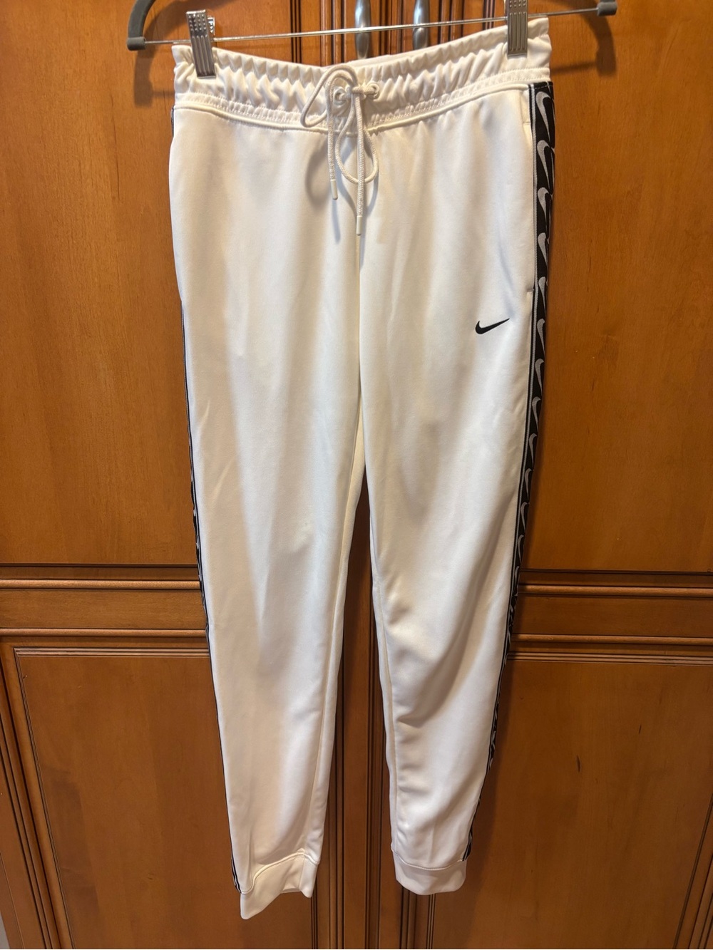 Nike White Joggers with Black Swoosh and Logo Tape. Size: XS